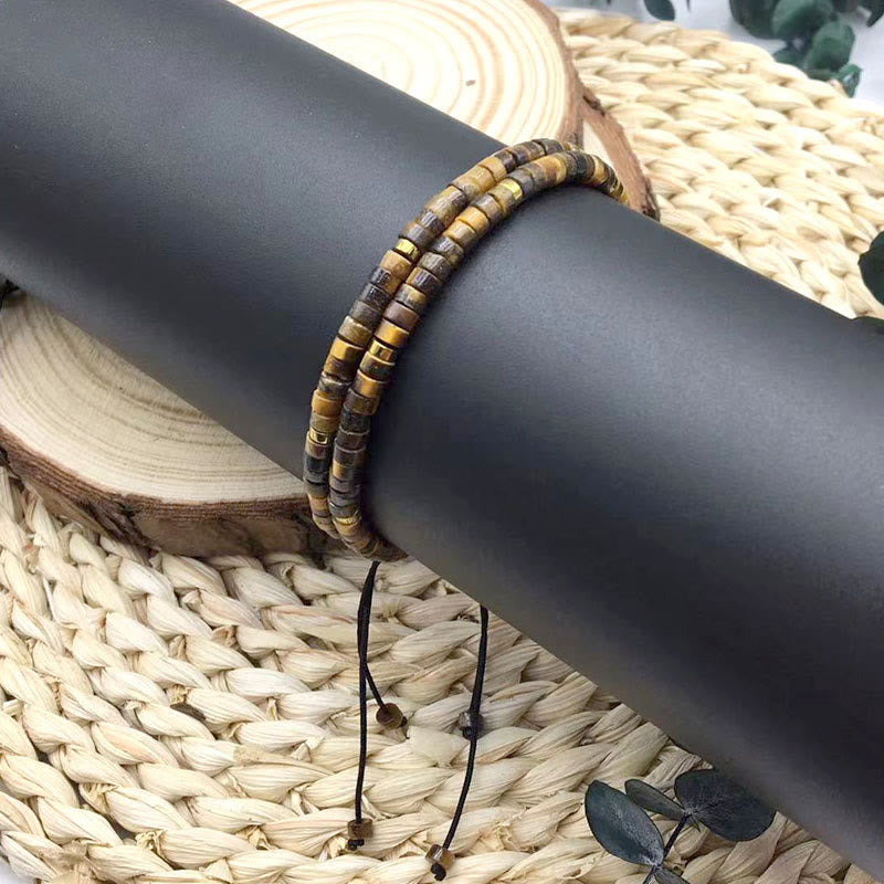 Buddha Stones Armband mit natürlichen Tigeraugen-Abstandsperlen und Mut