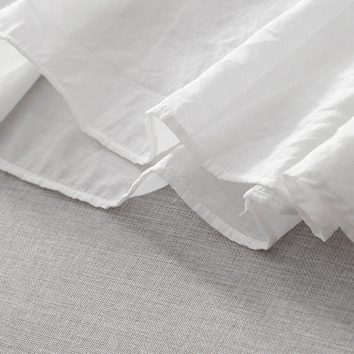 Buddha Stones Sommer-Midikleid in Weiß mit reiner Farbe, Stickerei, Blattblume, V-Ausschnitt, kurzärmelig, mit Taschen - image 9