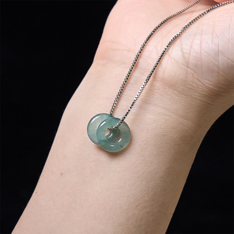 Halskette mit Anhänger aus Jade mit doppelter Friedensschnalle und Wohlstandssymbol von Buddha Stones