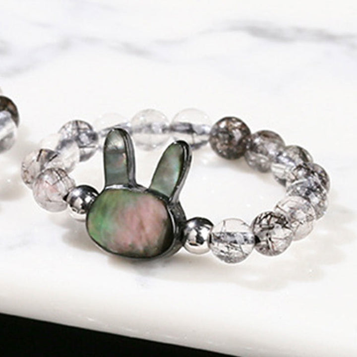 Buddha Stones 3 mm schwarzer Rutilquarz Tridacna-Stein Kaninchen-Katzen-Ring
