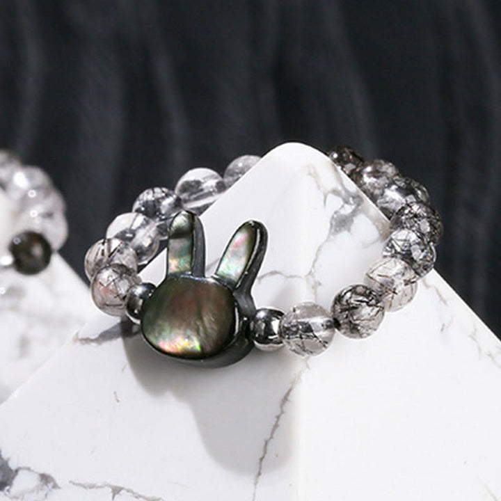 Buddha Stones 3 mm schwarzer Rutilquarz Tridacna-Stein Kaninchen-Katzen-Ring