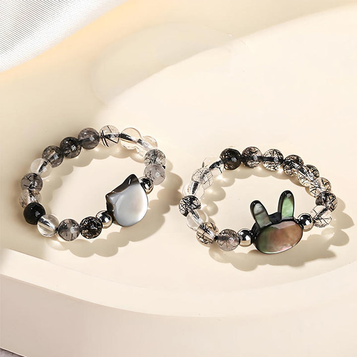Buddha Stones 3 mm schwarzer Rutilquarz Tridacna-Stein Kaninchen-Katzen-Ring