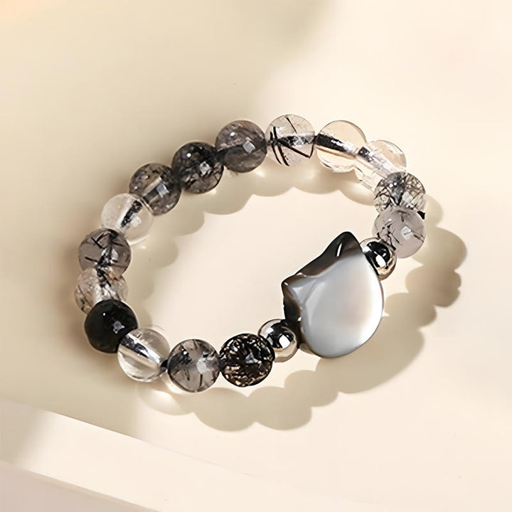 Buddha Stones 3 mm schwarzer Rutilquarz Tridacna-Stein Kaninchen-Katzen-Ring