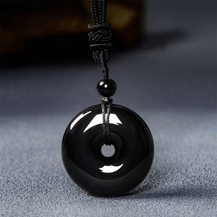 Buddha Stones Natürlicher schwarzer Obsidian Friedensschnalle Stärke Seil Halskette Anhänger