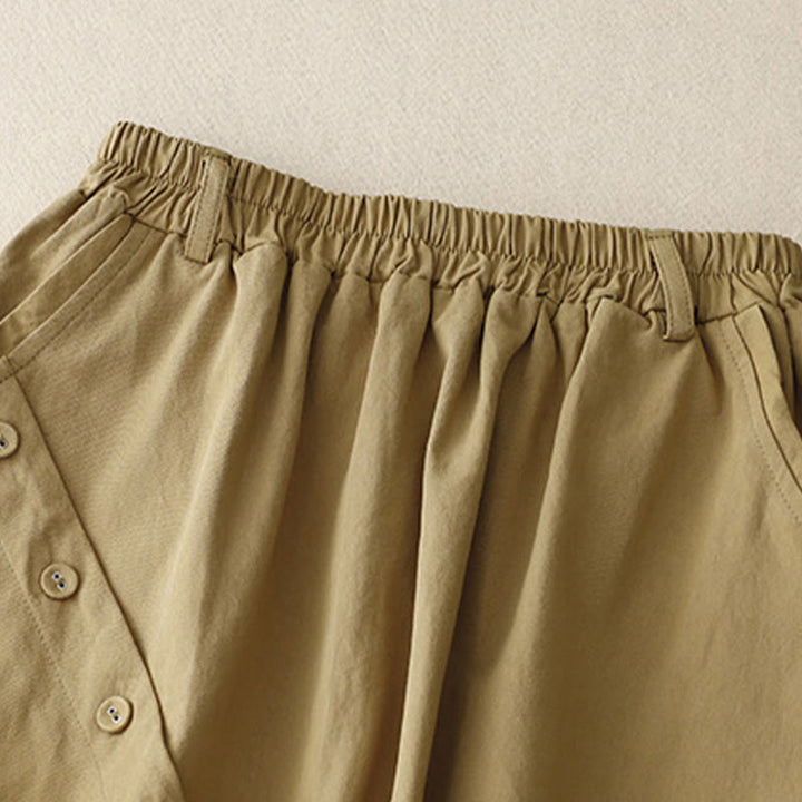 Buddha Stones Lässiger, schlichter, asymmetrischer Baumwollrock mit Knopfdesign und Taschen - image 2