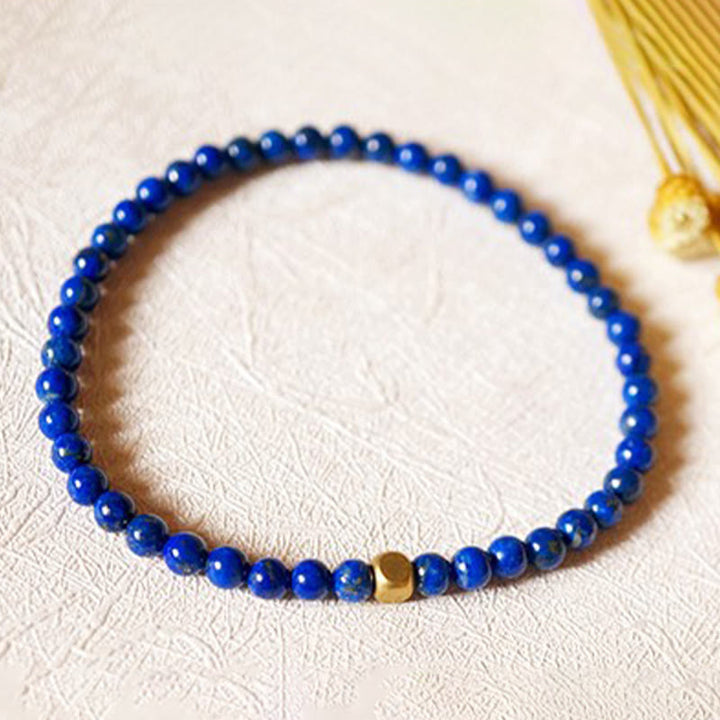 Buddha Stones 4 mm ultradünnes Lazurite-Perlen-Selbstpflegearmband