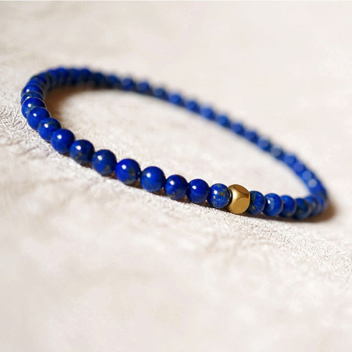 Buddha Stones 4 mm ultradünnes Lazurite-Perlen-Selbstpflegearmband