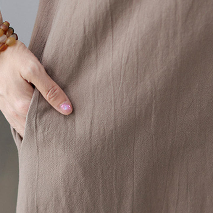 Buddha Stones – Lässiges, schlichtes Midikleid aus Baumwolle und Leinen mit seitlicher Schnürung und Revers, kurzärmelig - image 11