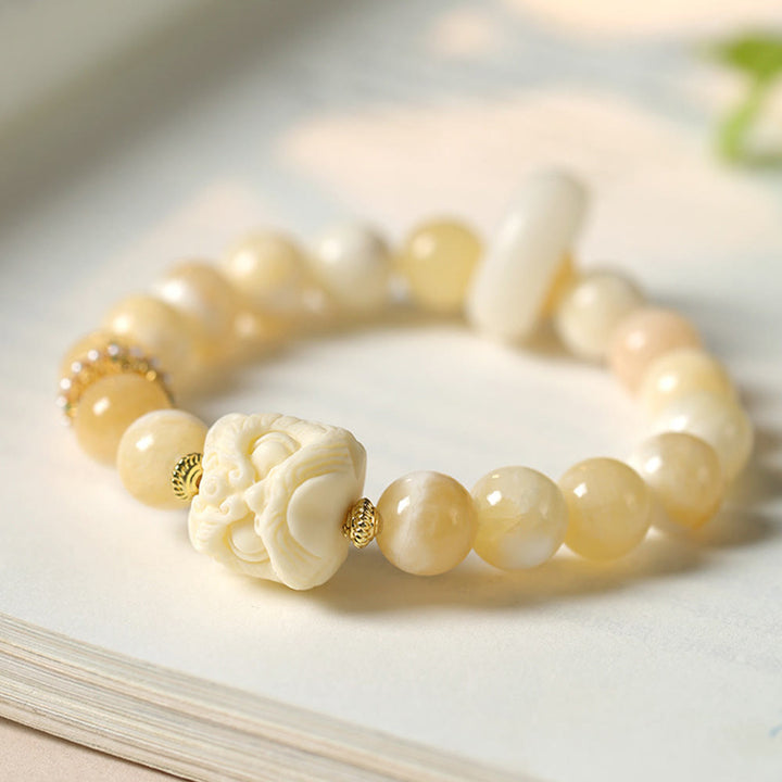 Buddha Stones Bernstein Grau Achat Elfenbein Frucht Vertrauen Armband