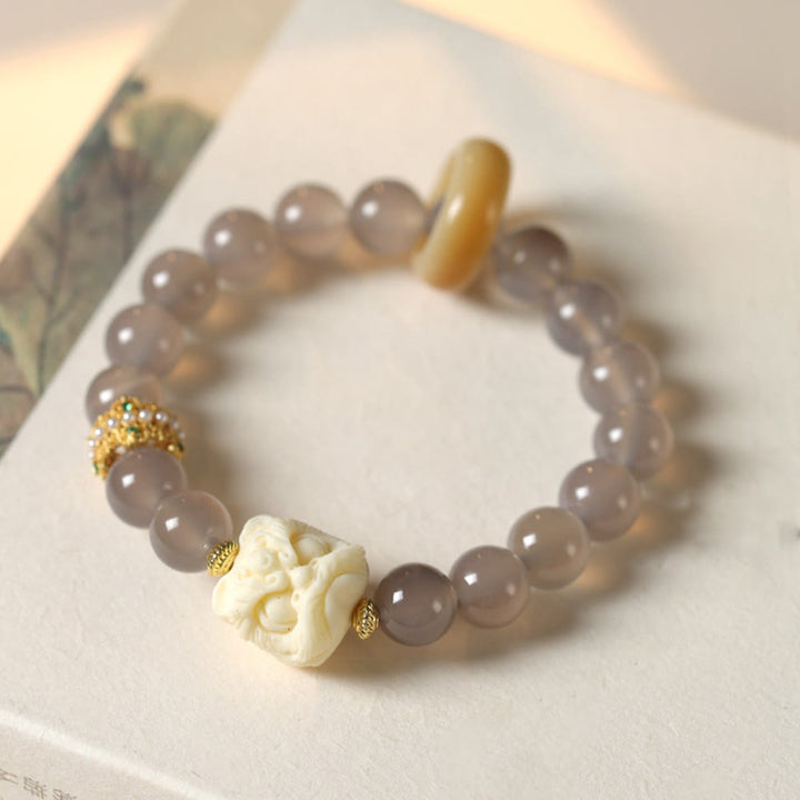Buddha Stones Bernstein Grau Achat Elfenbein Frucht Vertrauen Armband