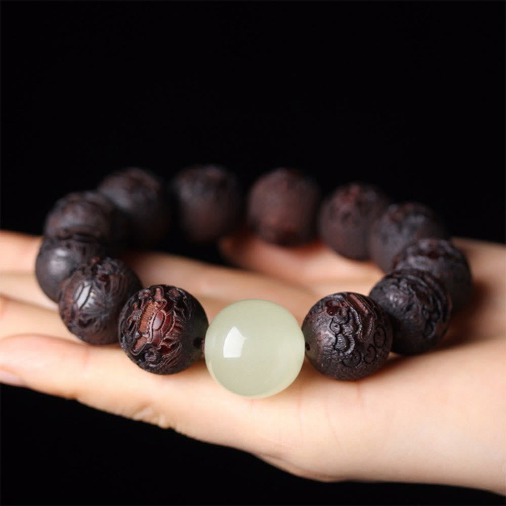 PiXiu Wärmearmband mit Buddha Stones und Gravur aus tibetischem Rosenholz - image 1