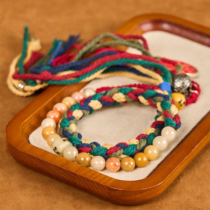 Buddha Stones Tibetische Berggeister geben Geld aus Buntes Chalcedon Doppellagiges positives Armband mit farbiger Seilquaste