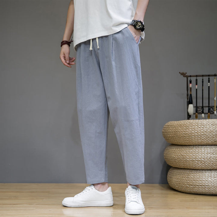 Buddha Stones Lässige Herrenhose aus Baumwollleinen mit Kordelzug und Taschen in reiner Farbe und konischem Design