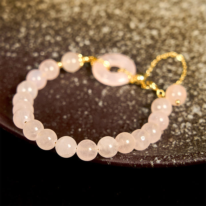 Buddha Stones Natürliche rosa Kristallperlen Peace Buckle Selbstakzeptanzarmband