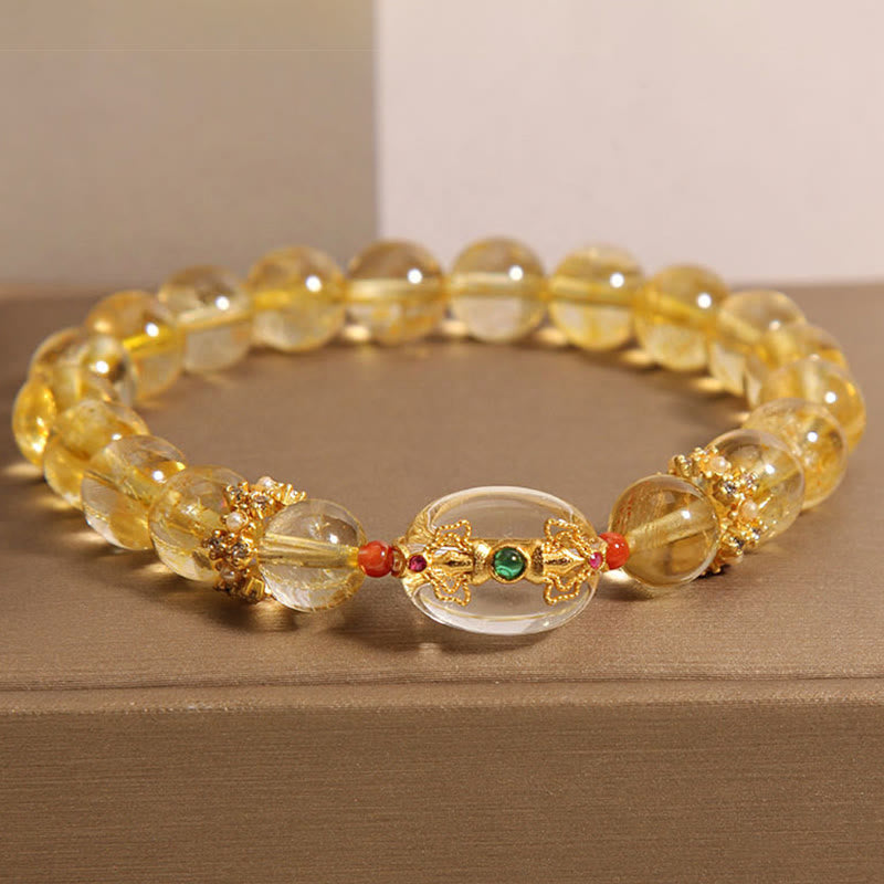 Buddha Stones Armband mit natürlichen goldenen Rutilquarzperlen und Glücksbringer