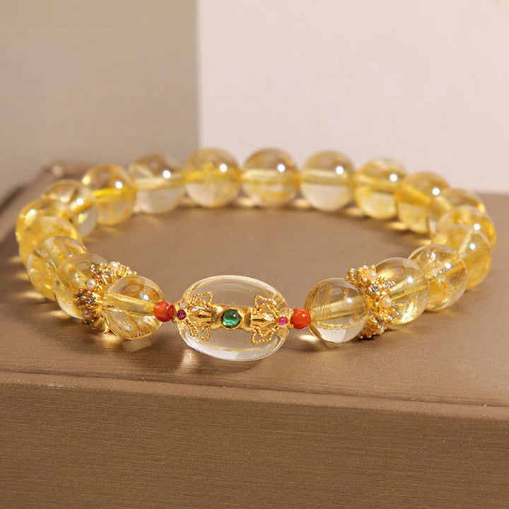 Buddha Stones Armband mit natürlichen goldenen Rutilquarzperlen und Glücksbringer