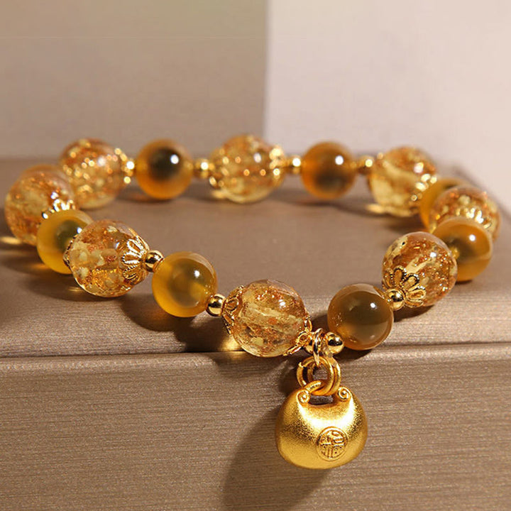 Buddha Stones Gelber Bonbon-Achat Fu Charakter Segensbeutel Heilungsarmband