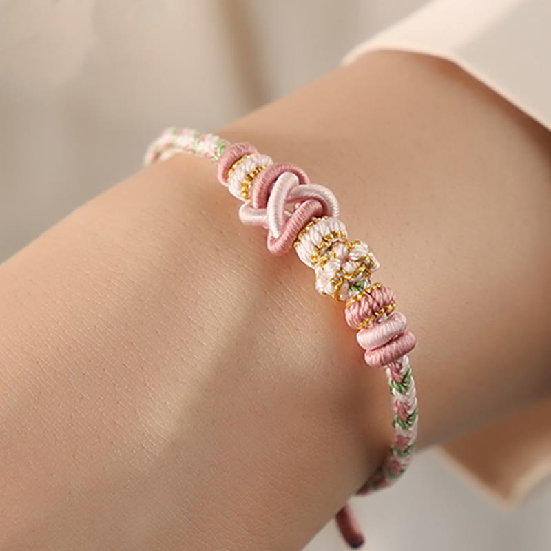 Buddha Stones Handgefertigtes Pfirsichblüten-Friedensknoten-Armband mit buntem Seil, verstellbar