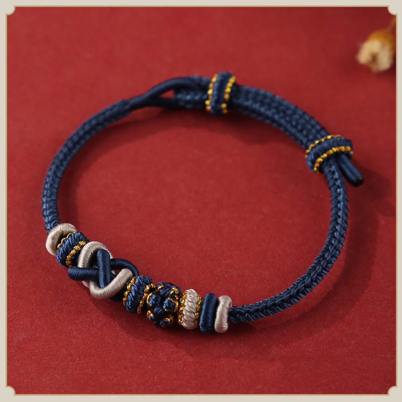 Buddha Stones Handgefertigtes Pfirsichblüten-Friedensknoten-Armband mit buntem Seil, verstellbar