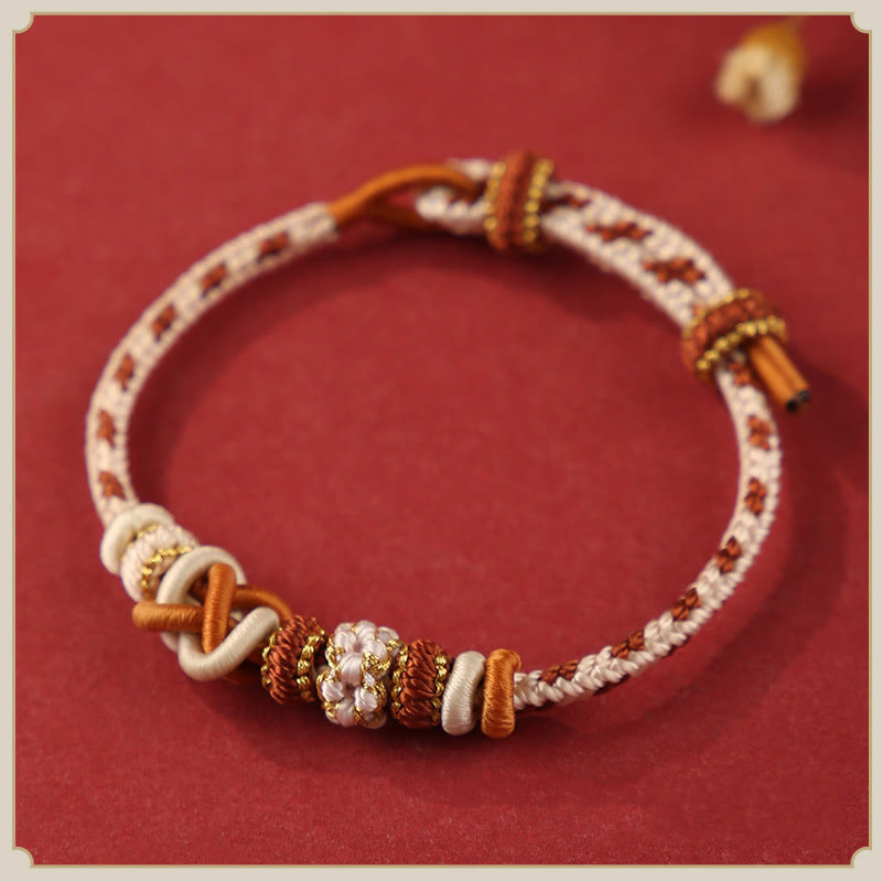 Buddha Stones Handgefertigtes Pfirsichblüten-Friedensknoten-Armband mit buntem Seil, verstellbar