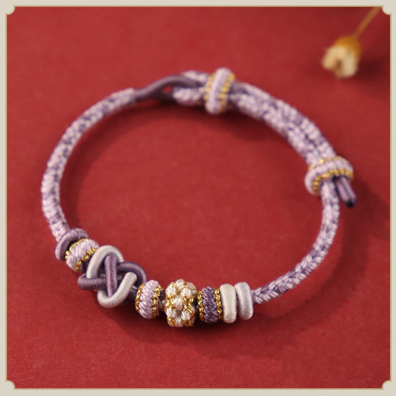 Buddha Stones Handgefertigtes Pfirsichblüten-Friedensknoten-Armband mit buntem Seil, verstellbar