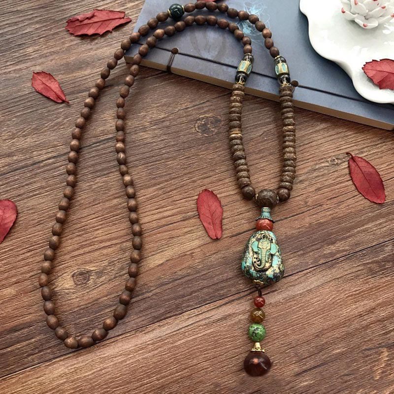 Buddha Stones, tibetische handgefertigte Wenge-Holz-Schutz-Dzi-Perle, Elefantenkopf-Halskettenanhänger