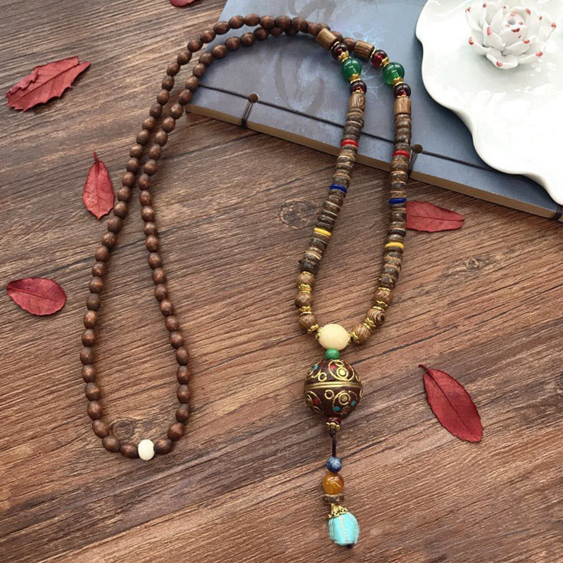Buddha Stones, tibetische handgefertigte Kokosnussschale, Schima-Holz, tolle helle Mantra-Kupferperlen, Balance-Halskettenanhänger