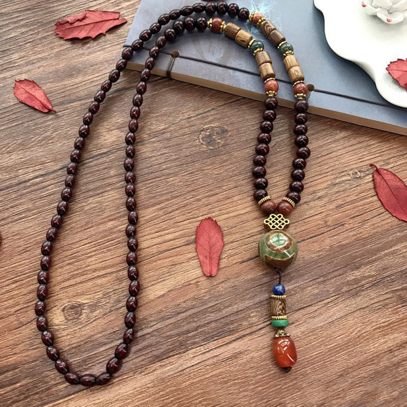 Buddha Stones, tibetische handgefertigte Wenge-Holz-Schutz-Dzi-Perle, Elefantenkopf-Halskettenanhänger