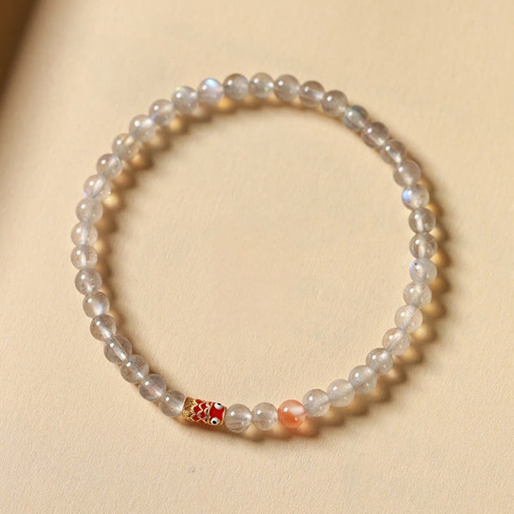 Buddha Stones Ultradünnes Mondstein-Koi-Fisch-Heilarmband