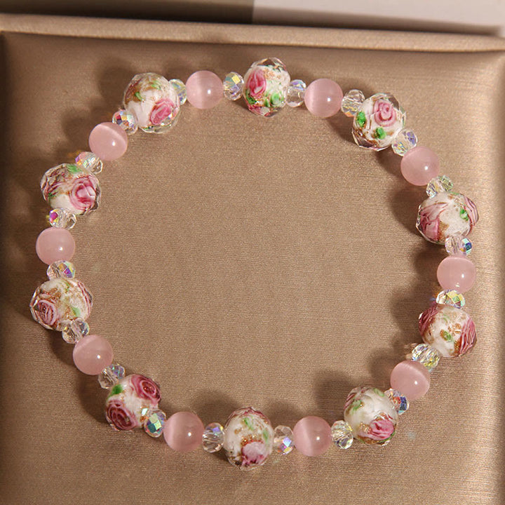 Buddha Stones Rosa Kristall Liuli Glasperlen Katzenauge Wärmearmband