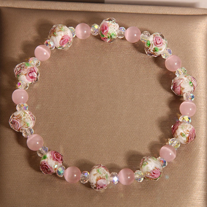 Buddha Stones Rosa Kristall Liuli Glasperlen Katzenauge Wärmearmband