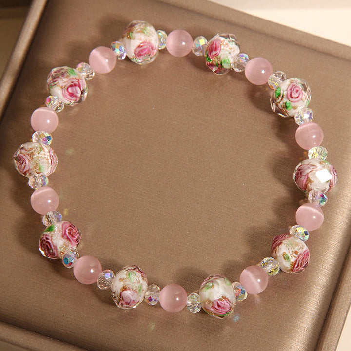 Buddha Stones Rosa Kristall Liuli Glasperlen Katzenauge Wärmearmband