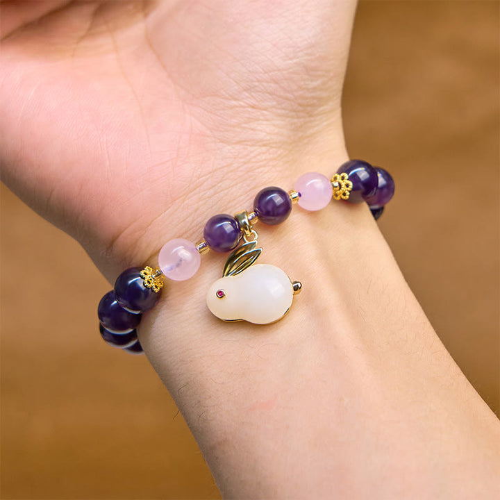 Buddha Stones Armband mit natürlichen Amethyst-Kaninchenperlen und innerem Frieden