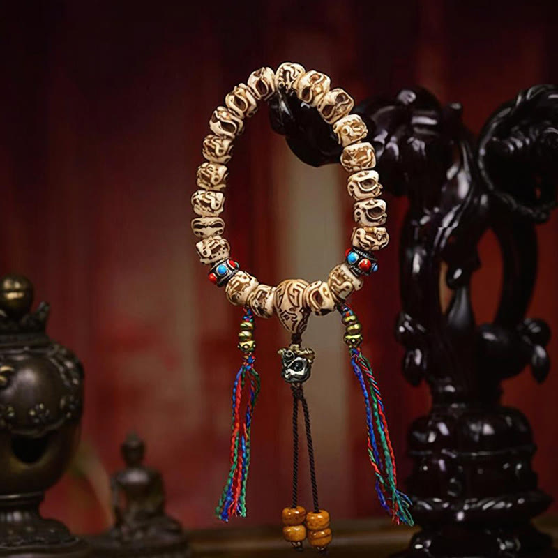 Armband mit Quaste aus tibetischem Kamelknochen und geschnitztem Garuda-Schutz aus Buddha Stones