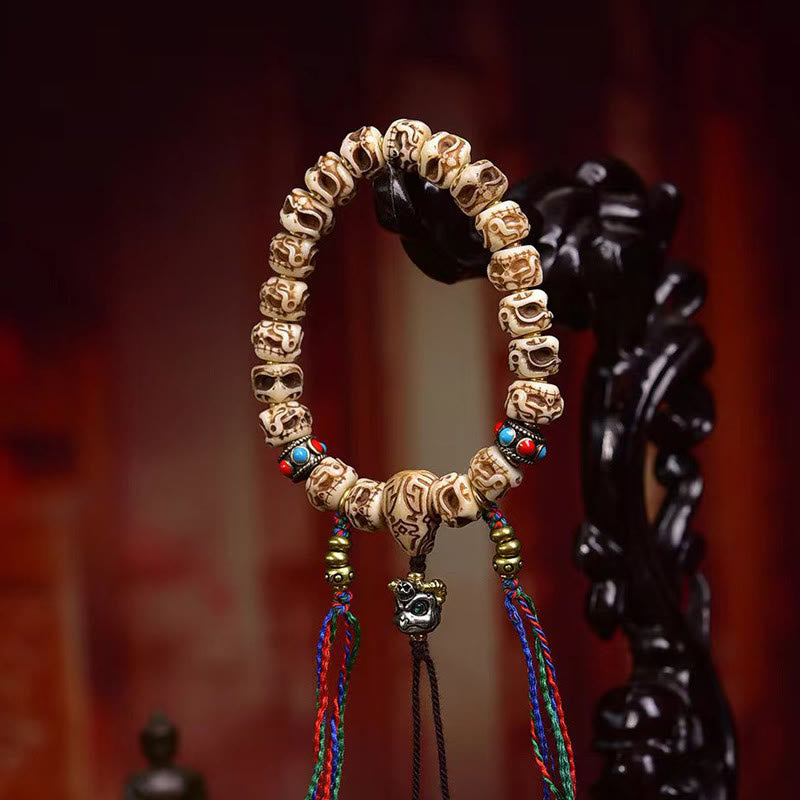 Armband mit Quaste aus tibetischem Kamelknochen und geschnitztem Garuda-Schutz aus Buddha Stones