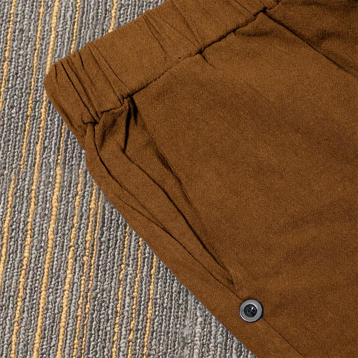 Buddha Stones Lässige Damenhose aus Baumwollleinen in reiner Farbe mit hohlen Knopfmanschetten und Taschen