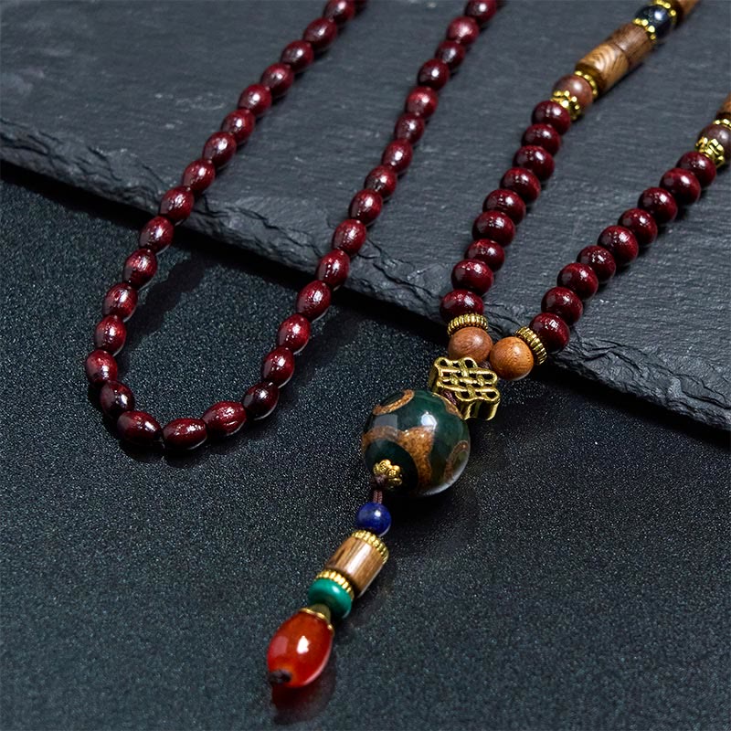 Buddha Stones, tibetische handgefertigte Wenge-Holz-Schutz-Dzi-Perle, Elefantenkopf-Halskettenanhänger