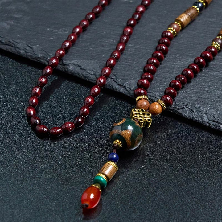Buddha Stones, tibetische handgefertigte Wenge-Holz-Schutz-Dzi-Perle, Elefantenkopf-Halskettenanhänger