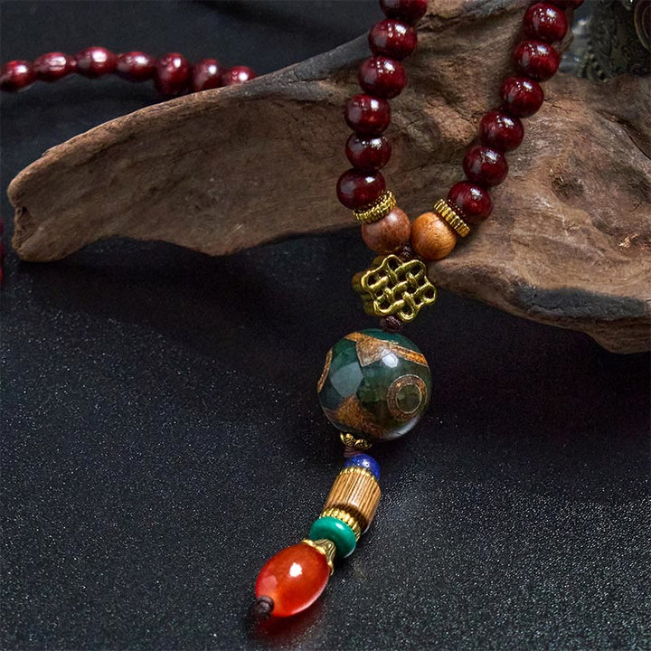 Buddha Stones, tibetische handgefertigte Wenge-Holz-Schutz-Dzi-Perle, Elefantenkopf-Halskettenanhänger