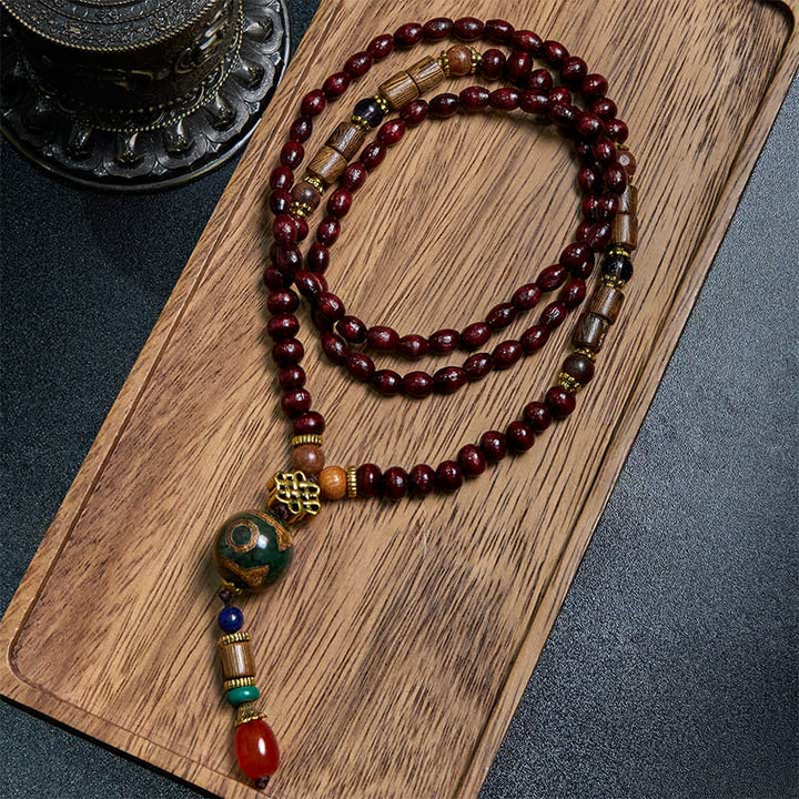 Buddha Stones, tibetische handgefertigte Wenge-Holz-Schutz-Dzi-Perle, Elefantenkopf-Halskettenanhänger
