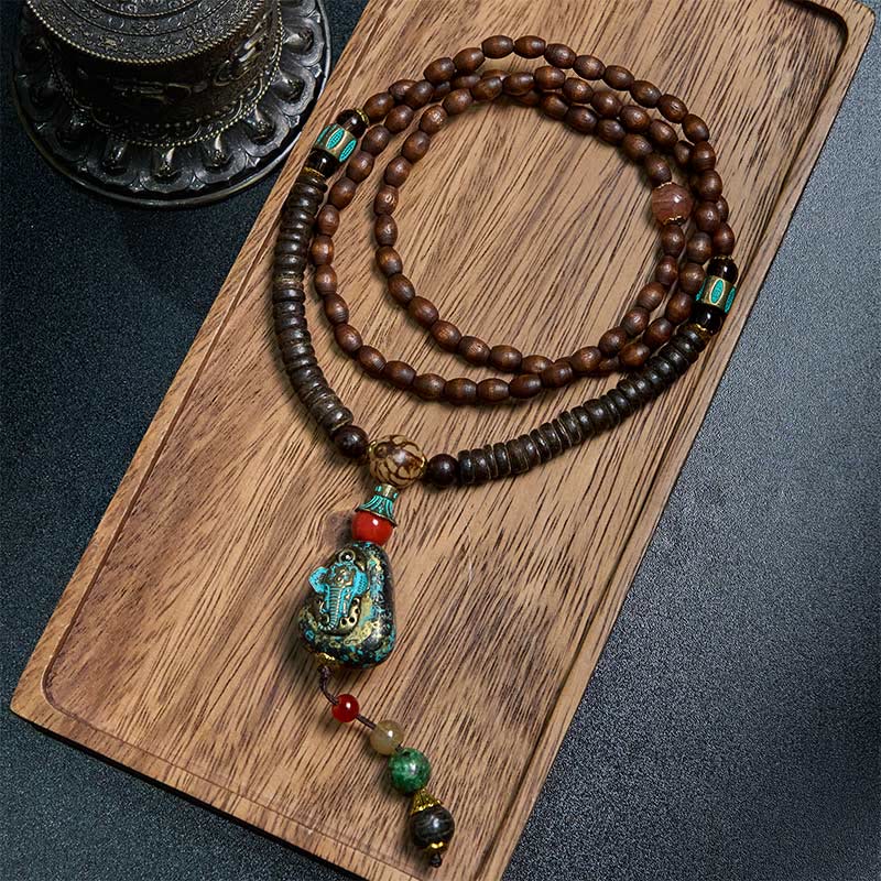 Buddha Stones, tibetische handgefertigte Wenge-Holz-Schutz-Dzi-Perle, Elefantenkopf-Halskettenanhänger