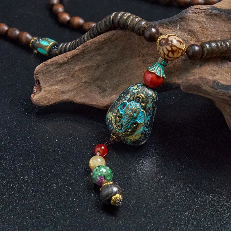Buddha Stones, tibetische handgefertigte Wenge-Holz-Schutz-Dzi-Perle, Elefantenkopf-Halskettenanhänger