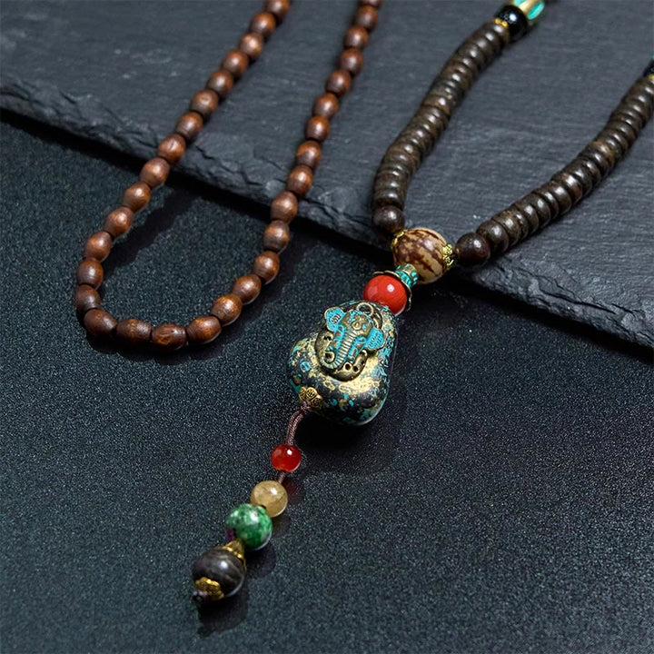 Buddha Stones, tibetische handgefertigte Wenge-Holz-Schutz-Dzi-Perle, Elefantenkopf-Halskettenanhänger