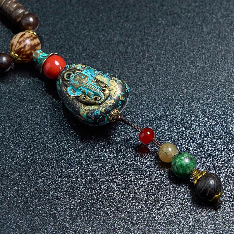 Buddha Stones, tibetische handgefertigte Wenge-Holz-Schutz-Dzi-Perle, Elefantenkopf-Halskettenanhänger