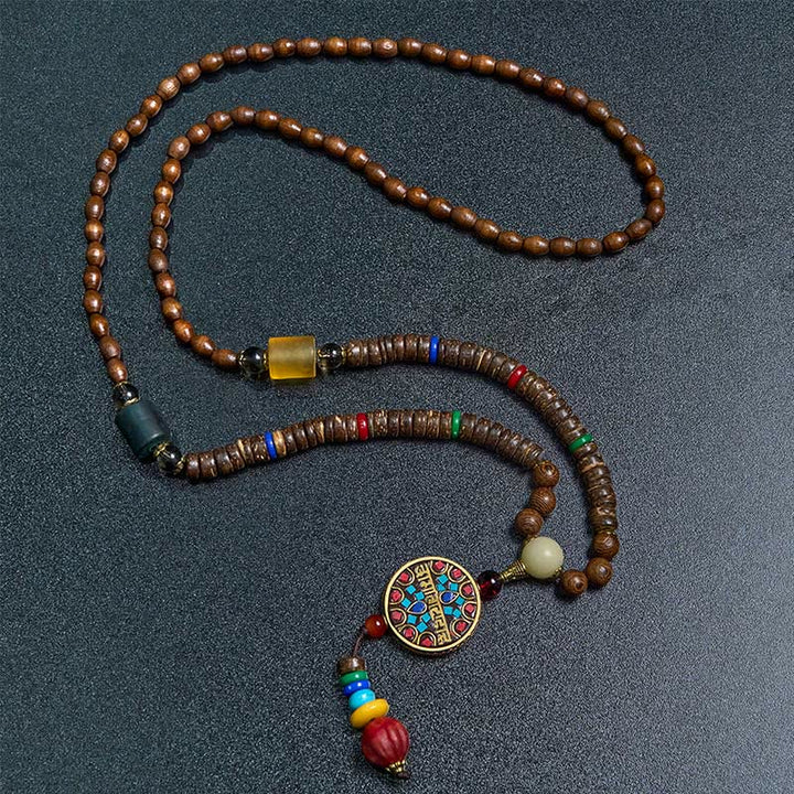 Buddha Stones, tibetische handgefertigte Kokosnussschale, Schima-Holz, tolle helle Mantra-Kupferperlen, Balance-Halskettenanhänger