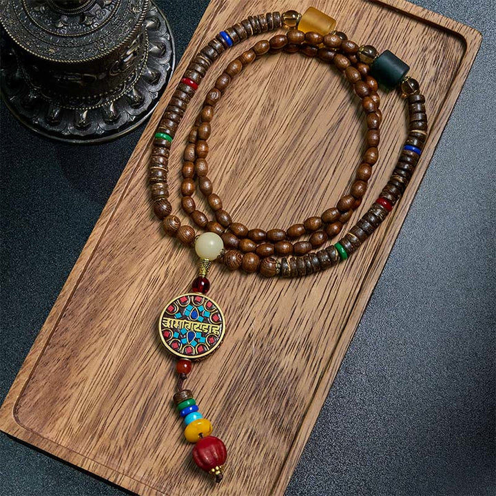 Buddha Stones, tibetische handgefertigte Kokosnussschale, Schima-Holz, tolle helle Mantra-Kupferperlen, Balance-Halskettenanhänger