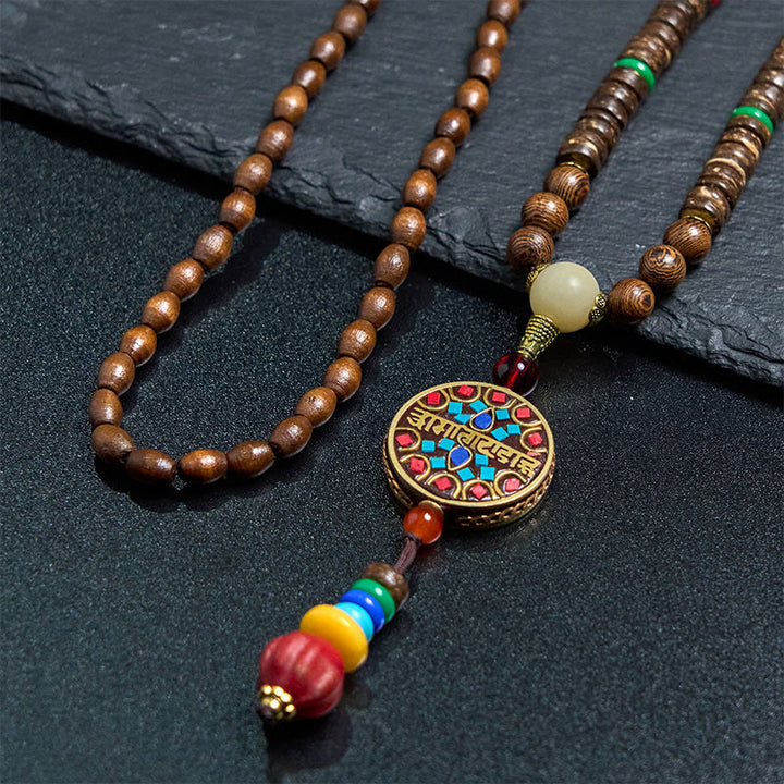 Buddha Stones, tibetische handgefertigte Kokosnussschale, Schima-Holz, tolle helle Mantra-Kupferperlen, Balance-Halskettenanhänger