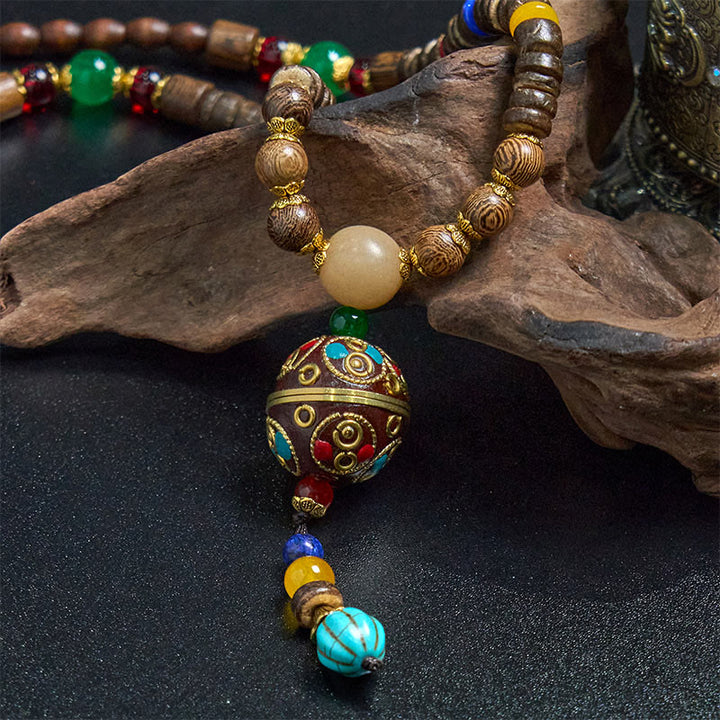 Buddha Stones, tibetische handgefertigte Kokosnussschale, Schima-Holz, tolle helle Mantra-Kupferperlen, Balance-Halskettenanhänger