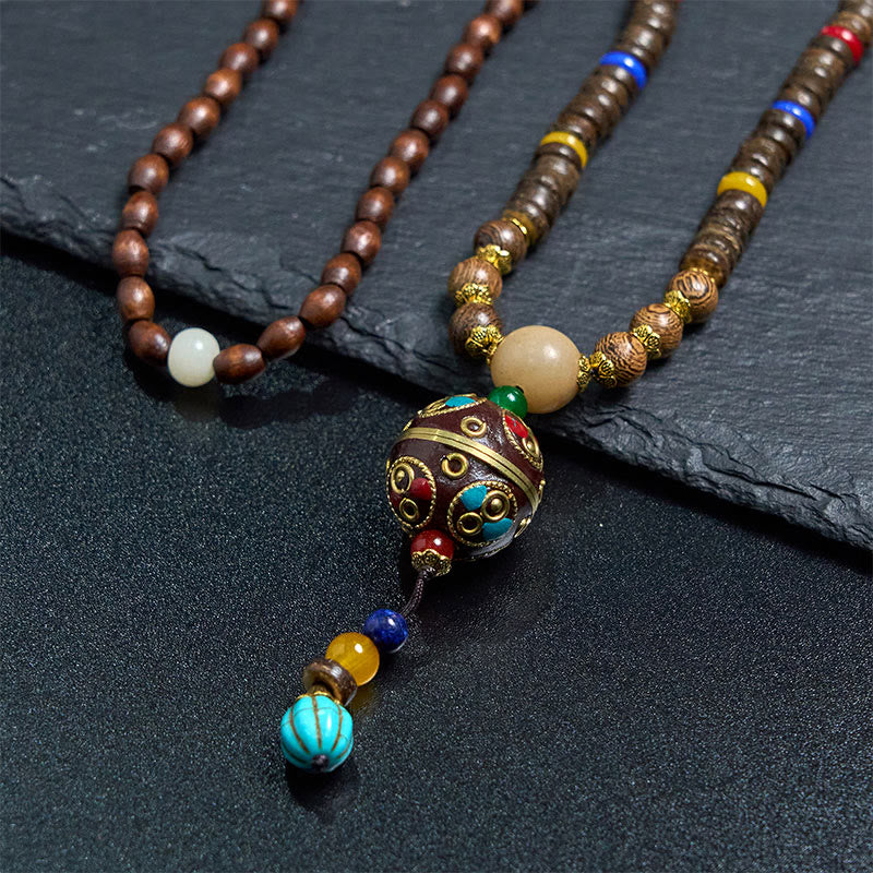 Buddha Stones, tibetische handgefertigte Kokosnussschale, Schima-Holz, tolle helle Mantra-Kupferperlen, Balance-Halskettenanhänger