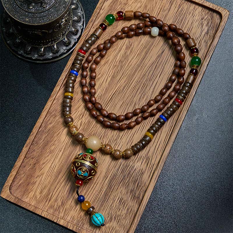 Buddha Stones, tibetische handgefertigte Kokosnussschale, Schima-Holz, tolle helle Mantra-Kupferperlen, Balance-Halskettenanhänger